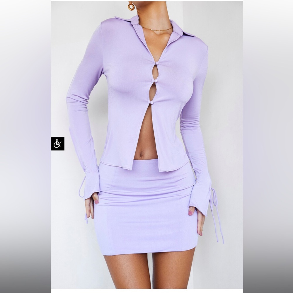 Mistress rocks ELITE lilac jersey fitted shirt and skirt set